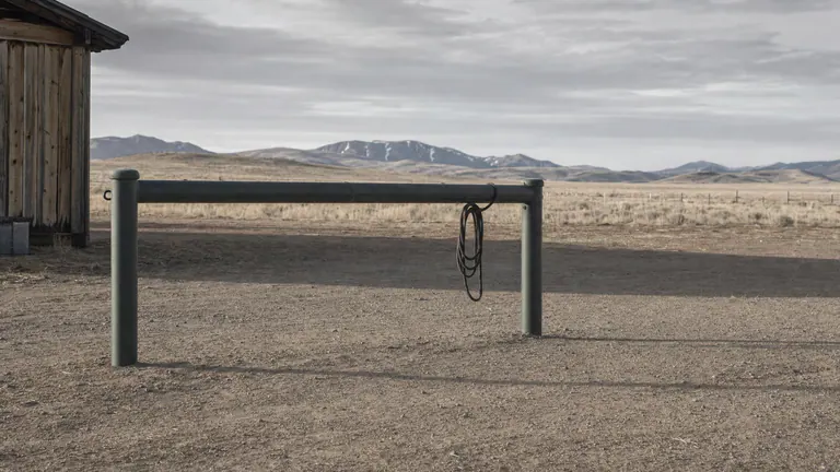 Heavy steel hitching posts and tie rails for horses